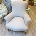 French vintage chair with a fan back beechwood turned legs. Covered in Taupe linen.C1900