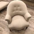 French vintage tub chair covered in Taupe linen with a buttoned back, beechwood legs. C1950.