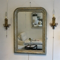 Pair of ormolu wall-lights stamped Leleu Paris with an early 19th C giltwood green french mirror
